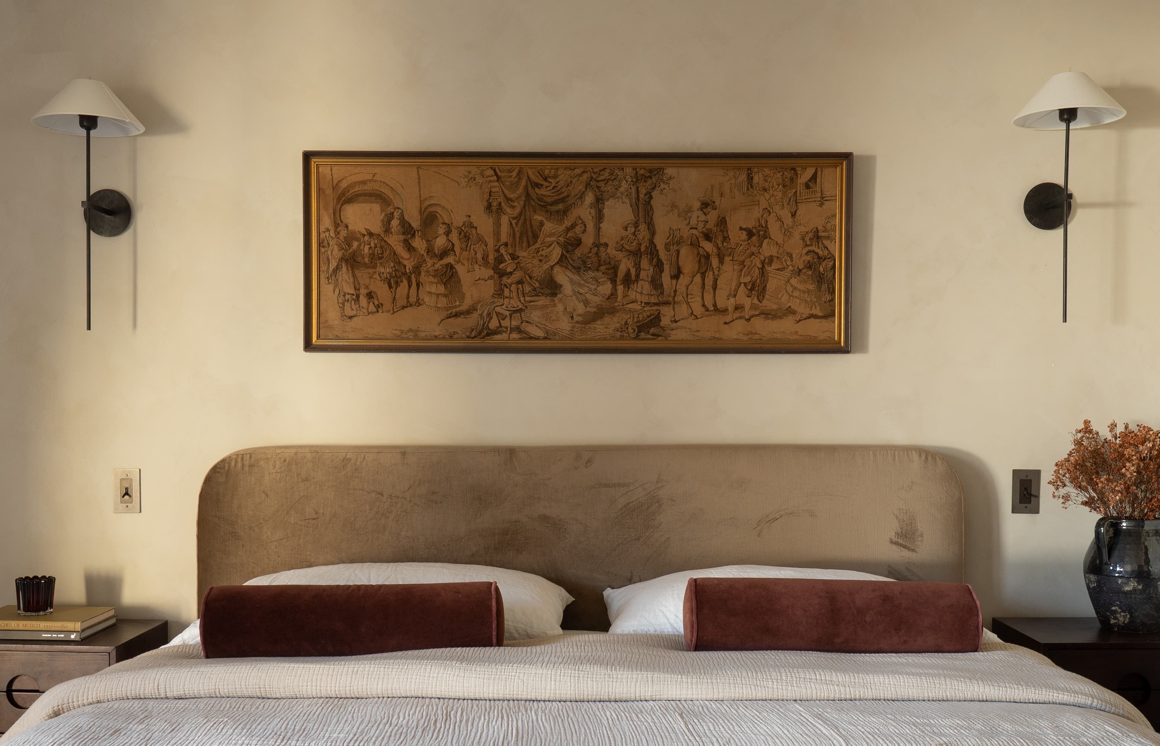 Modern bedroom MCM burgundy primary bed designed by Halcyon Haus
