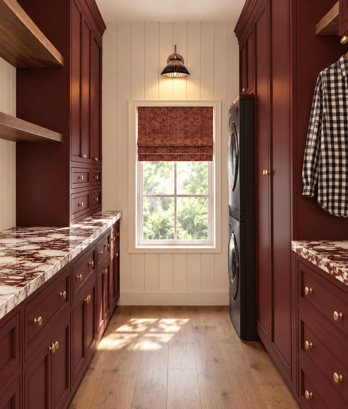Rendering of the finished laundry room with oxblood cabinetry, red-veined stone counters, brass hardware, and a patterned Roman shade