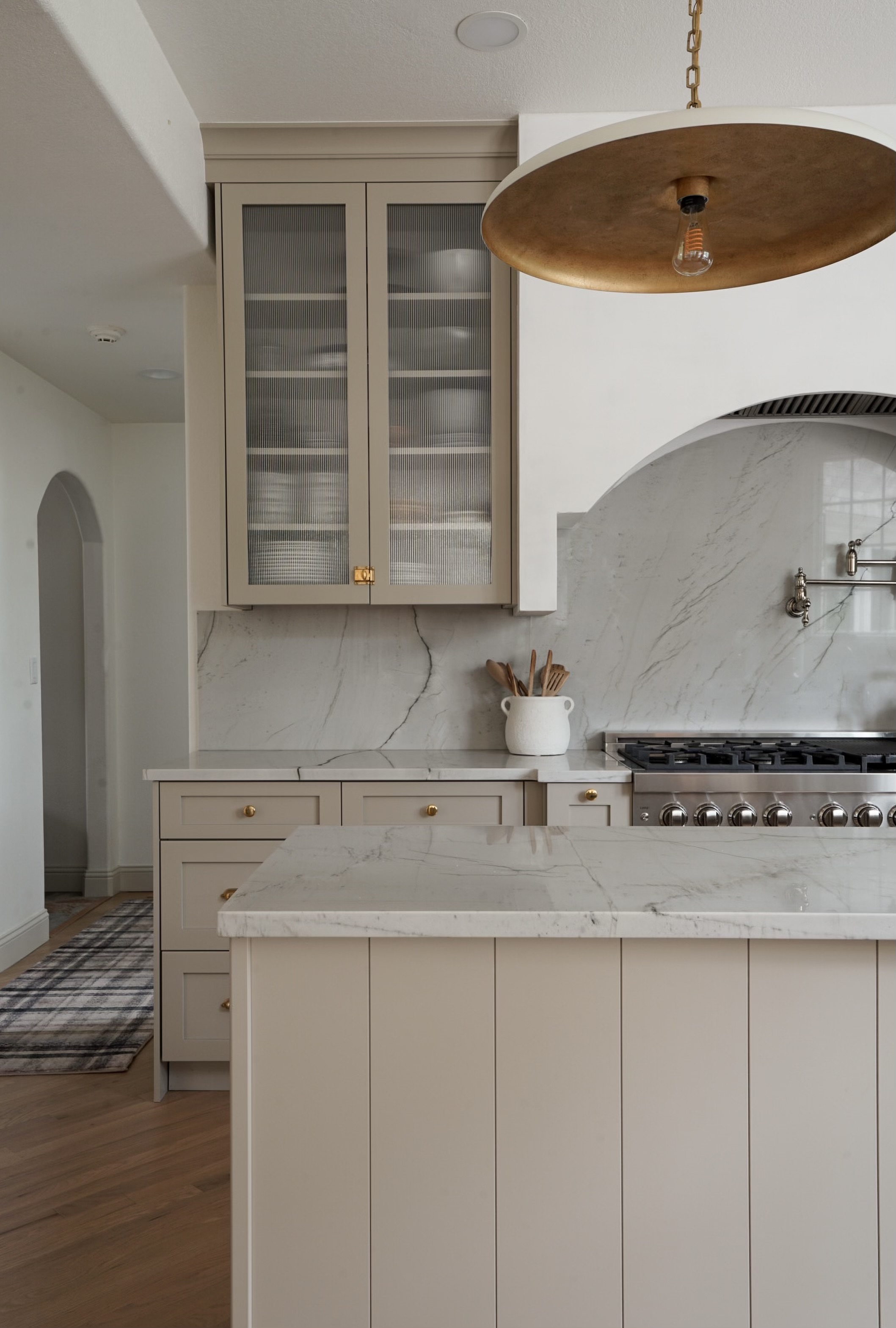 Side detail of Venetian plaster hood and spice cubbies in Canyon Cottage Kitchen